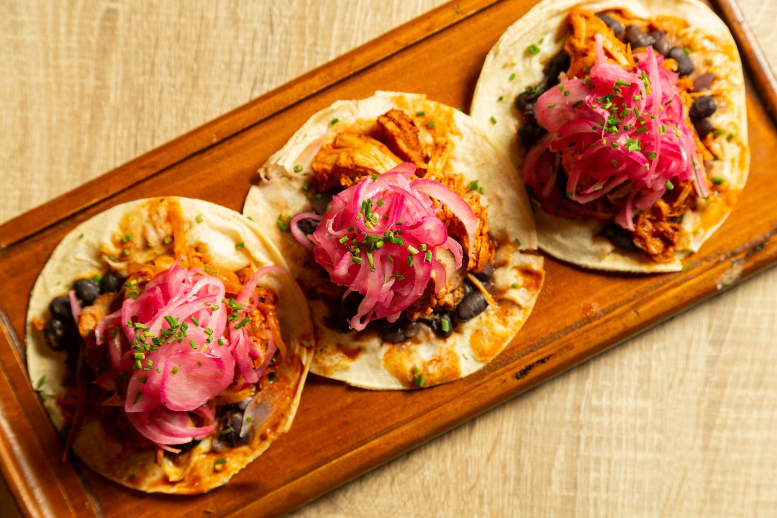 Mexican tacos with pickled onion and black beans in Costa Maya
