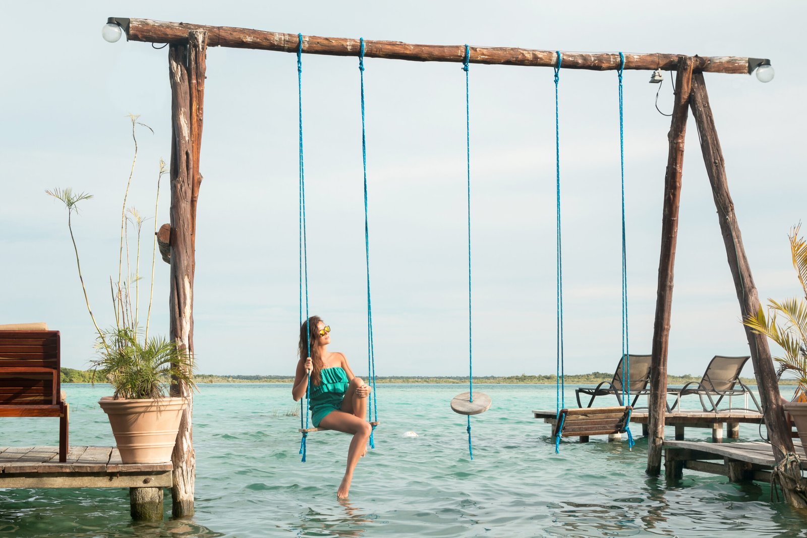 Turquoise waters of Bacalar Lagoon under a clear blue sky
